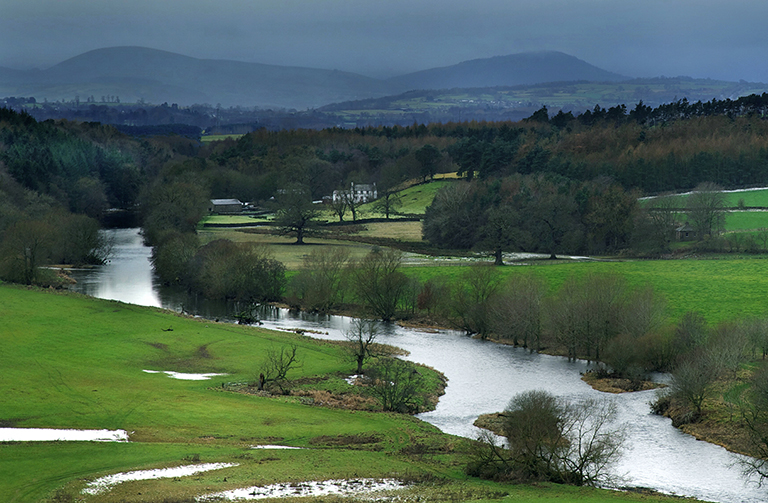 The River Eden flowing through a valley