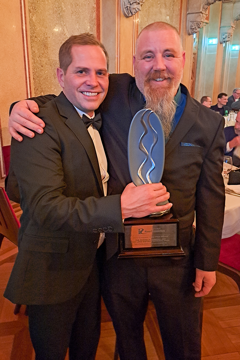 Lev and Olly holding the European Riverprize award